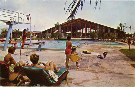 A Retro Day at the Yacht Club: This image from a postcard shows some families enjoying a day at the pool.