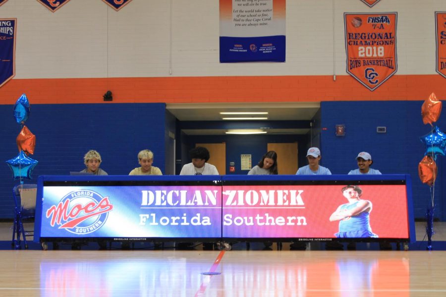 Signing day at Cape Coral High School. Athletes pictured in order of right to left: Robert Albert, wrestling at Graceland University; Richard Albert, wrestling at Ferrum College; Lucas Habash, baseball at Penn State, New Kensington; Isabella Sibbrell, cross country and track at Flagler College; Declan Ziomek, cross country and track at Florida Southern College; and William Canales, cross country and track at Florida Southern College.
